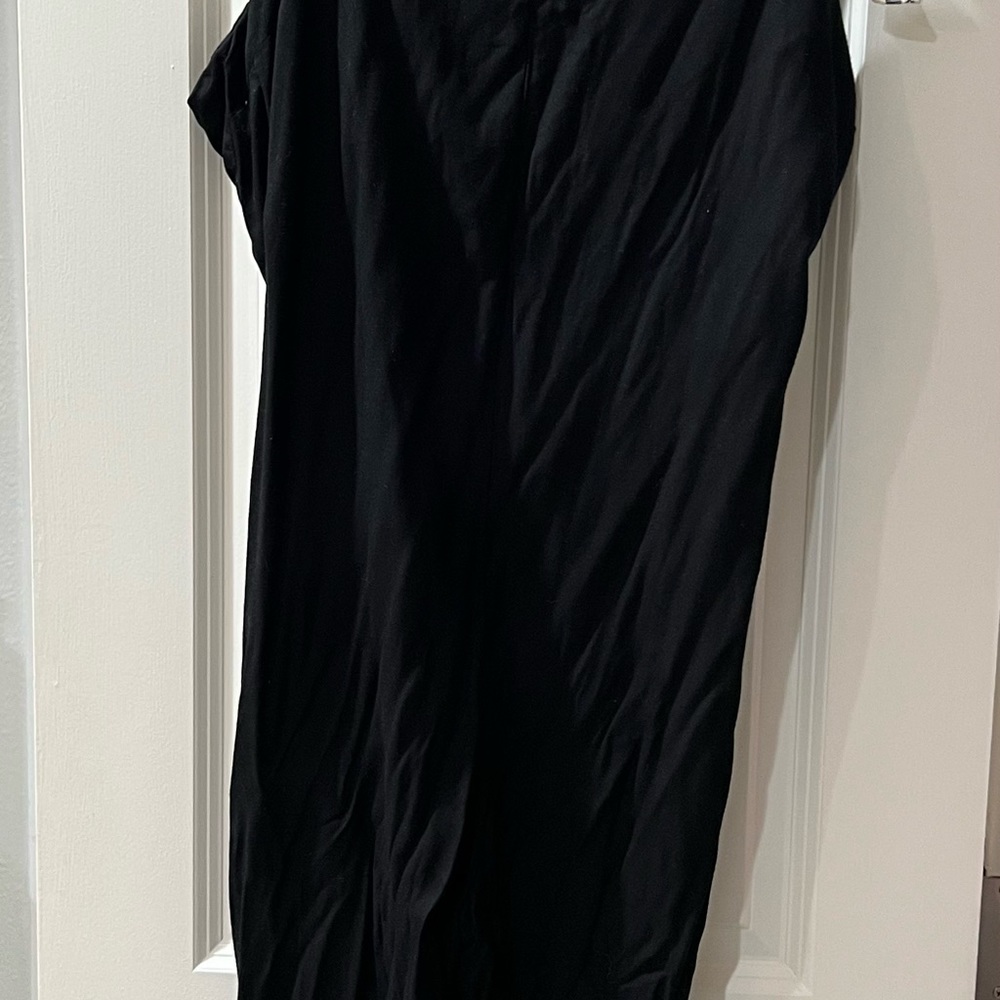 Black flows wide leg jump suit